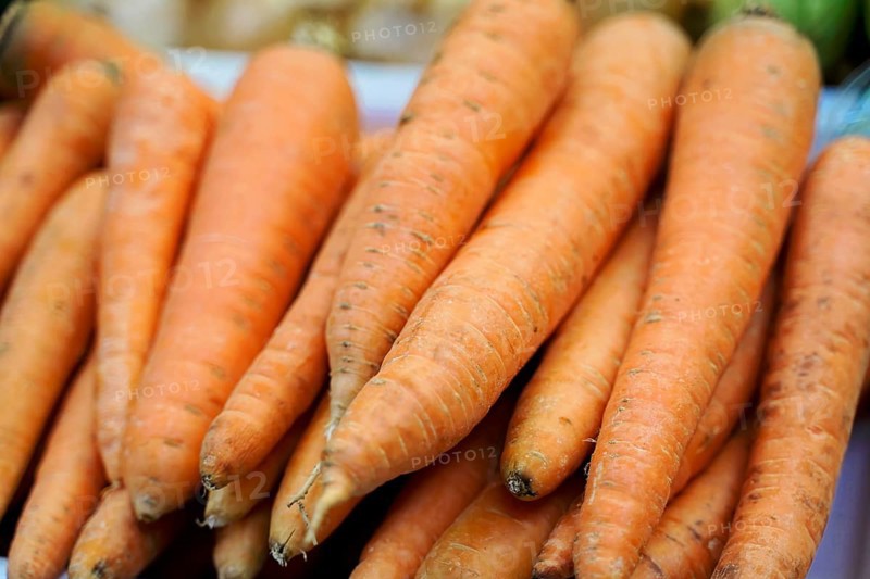 Market hall, Mercado de Nuestra Senora de Africa, Santa Cruz de Tenerife, Tenerife, Canary Islands, Spain, Europe, Pile of fresh carrots at a market, Europe
