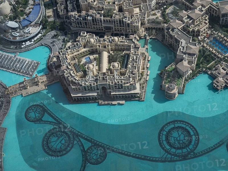 A luxurious hotel resort with large swimming pools and modern buildings, dubai, arab emirates