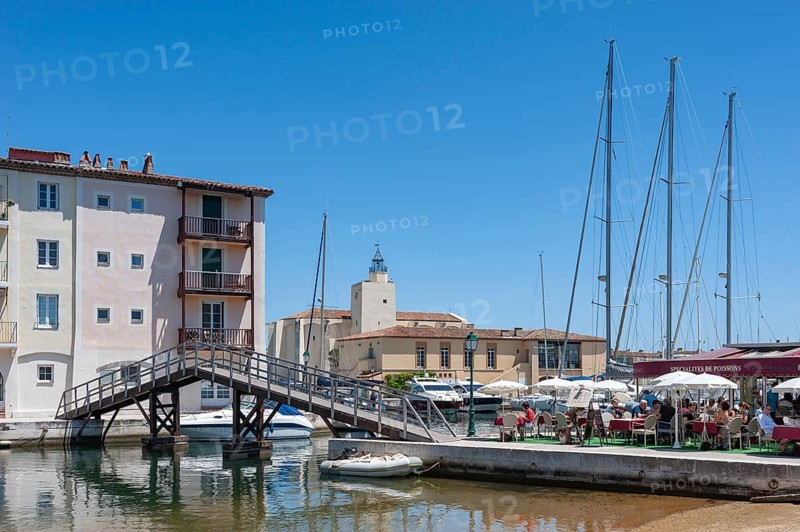 Townscape at the Rue des 2 Ports, in the background the church Saint-Francois d'Assise, Port Grimaud, Var, Provence-Alpes-Cote d Azur, France, Europe