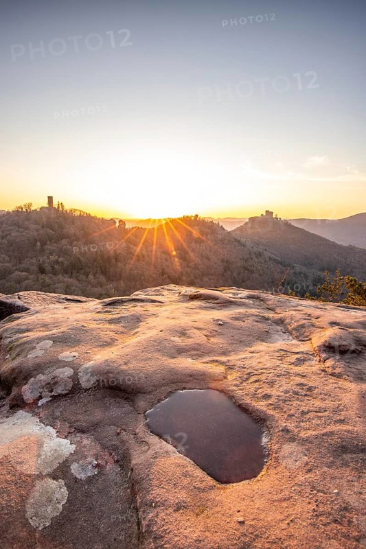 View of Trifels Castle, from Engels Landing rock, with the young tower in autumn at sunset. Beautiful landscape in the Palatinate Forest, Rhineland-Palatinate, Germany, Europe