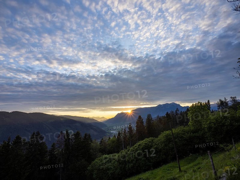 Sunset over the Eisenerz Alps, mountain massif Reiting, in the Liesingtal the village Traboch, view from the lowlands, Leoben, Styria, Austria, Europe