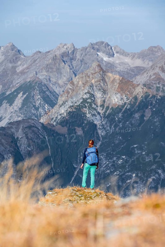Mountaineer in the mountains in autumn, Venet crossing, Oetztal Alps, Tyrol, Austria, Europe