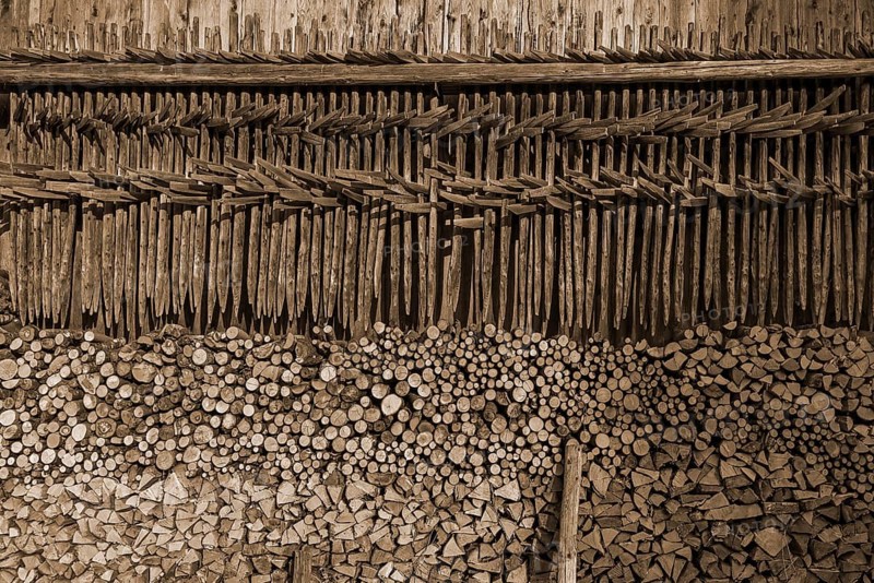 Stacked firewood and hanging hay, hay dryer at a barn, Bad Oberdorf, Allgaeu, Bavaria, Germany, Europe