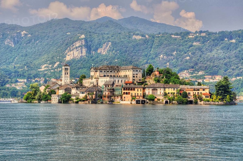 Beautiful Island San Giulio on Lake Orta and Mountain in a Sunny Day in Orta, Piedmont, Italy, Europe