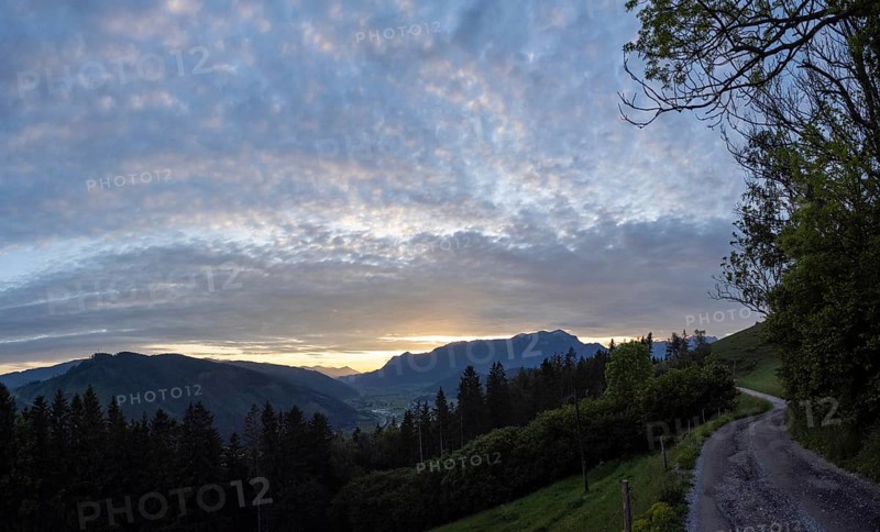 Sunset over the Eisenerz Alps, mountain massif Reiting, in the Liesingtal the village Traboch, panoramic shot, view from the lowlands, Leoben, Styria, Austria, Europe