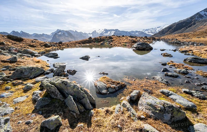Small lake on the high plateau of the Gurgler Seenplatte, glaciated mountain peaks in the background, in autumn, Sonnenstern, near Obergurgl, Oetztal Alps, Tyrol, Austria, Europe