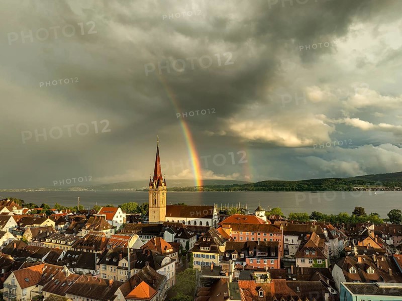 Aerial view of the town of Radolfzell on Lake Constance with the Radolfzell Minster in front of sunset, with a double rainbow after a heavy rainstorm, thunderstorm, thunderstorm, district of Constance, Baden-Wuerttemberg, Germany, Europe