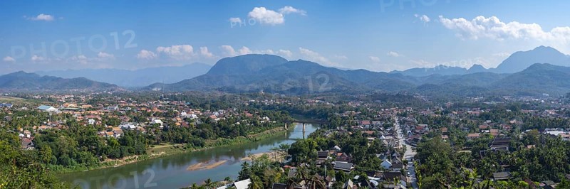 Panorama over Luang Prabang with Nam Khan River and Wat Phol Pao in the background, Laos, Asia