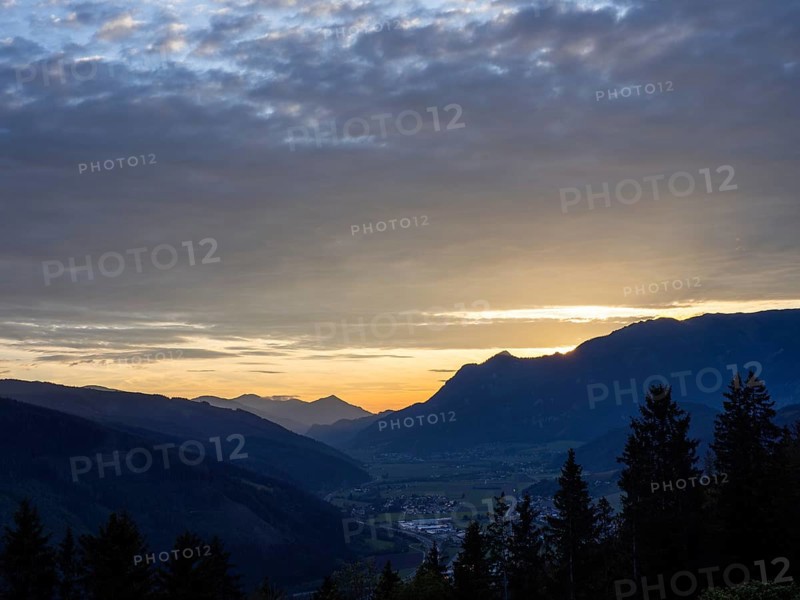 Sunset over the Eisenerz Alps, mountain massif Reiting, in the Liesingtal the village Traboch, view from the lowlands, Leoben, Styria, Austria, Europe