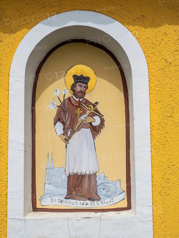 Image of a figure of a saint, fresco on a wayside cross, near St.Andrae-Hoech, Sausaler Weinland, Styria, Austria, Europe