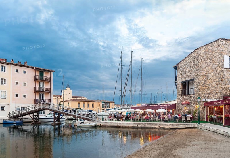 Townscape at the Rue des 2 Ports, in the background the church Saint-Francois d'Assise, Port Grimaud, Var, Provence-Alpes-Cote d Azur, France, Europe