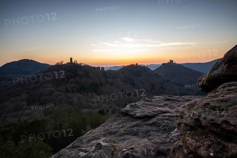 View of Trifels Castle, from Engels Landing rock, with the young tower in autumn at sunset. Beautiful landscape in the Palatinate Forest, Rhineland-Palatinate, Germany, Europe