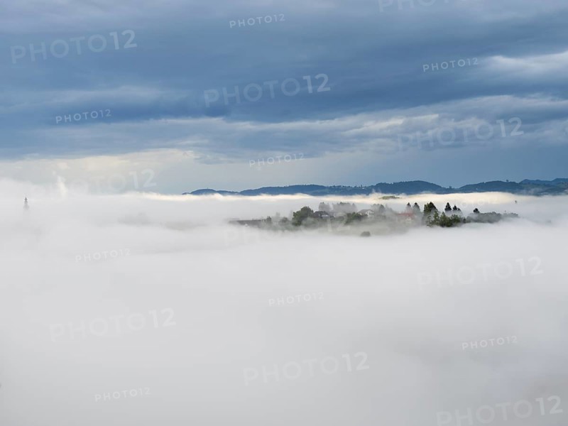 Morning fog over the village of Frauenberg, view from Silberberg, near Leibnitz, Styria, Austria, Europe