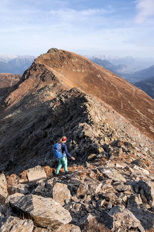 Mountaineer in the mountains in autumn, Venet crossing, Oetztal Alps, Tyrol, Austria, Europe