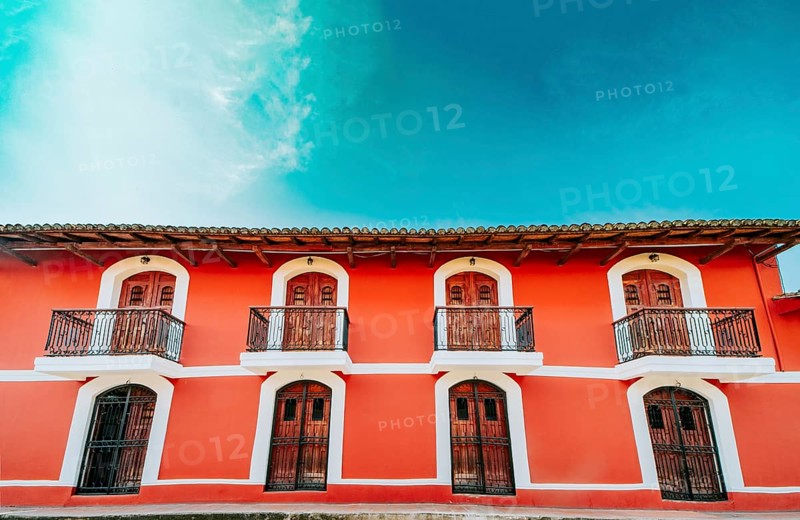 Colorful colonial house with 4 balconies. Granada, Nicaragua. Architecture of colorful houses of Granada