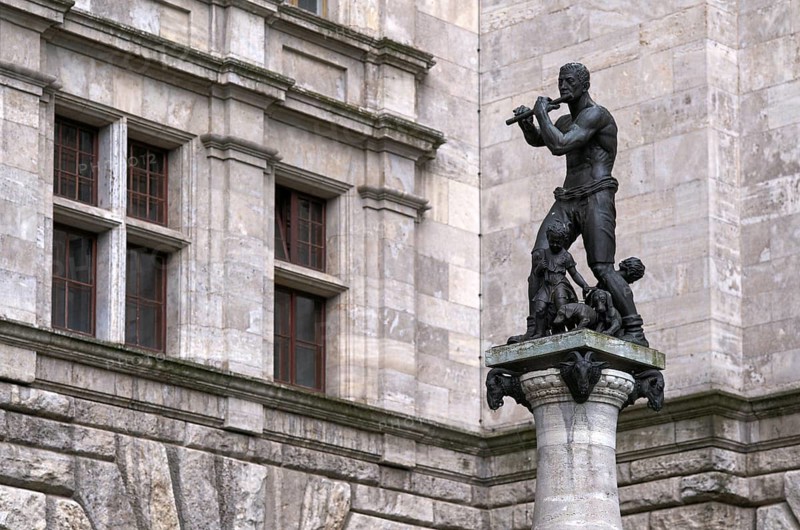 Flute player on town hall fountain, also known as Pied Piper fountain, Leipzig, Saxony, Germany, Europe