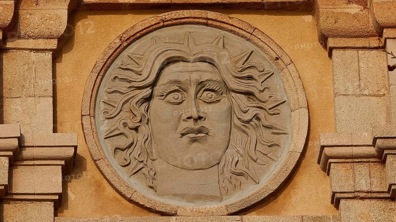 Sun god Helios, close-up of a stone sun face as a relief on an old building, Old Town of Rhodes, Rhodes Town, Rhodes, Dodecanese, Greek Islands, Greece, Europe