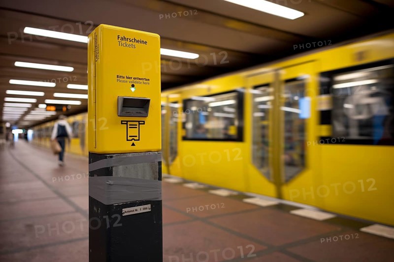 Ticket validator, ticket validation machine, tickets, incoming underground line U2, motion effect, stop, platform, Wittenbergplatz station, Berlin, Germany, Europe