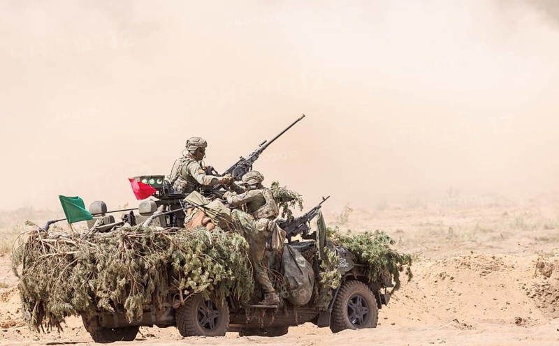 Dutch soldiers on a camouflaged Serval during the NATO Steadfast Defender large-scale manoeuvre in Pabrade, 29.05.2024