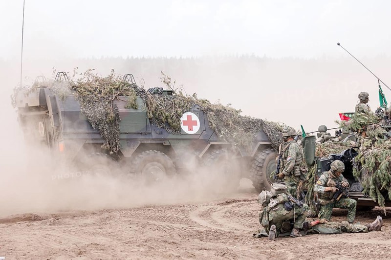 Dutch soldiers care for a simulated injured comrade as part of the NATO large-scale manoeuvre Steadfast Defender and the German part of the exercise, Quadriga 2024, in Pabrade, 29.05.2024