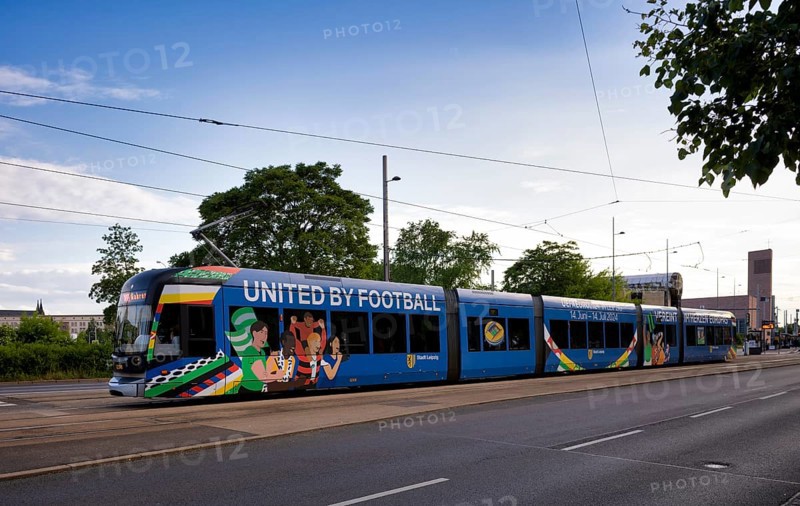 Tram, whole-car advertising for the EURO 2024, European Football Championship, Leipzig, logo, slogan Welcome to Leipzig, United by Friends, Leipzig, Saxony, Germany, Europe