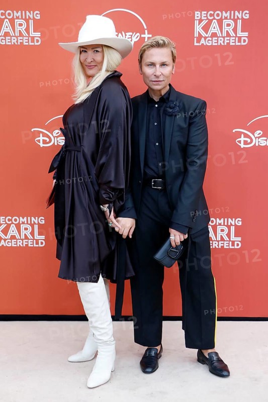 Dawid Tomaszewski and Sandra Hansen (designer, Lemanja) at the German premiere of Becoming Karl Lagerfeld at the Zoo Palast Berlin on 30 May 2024