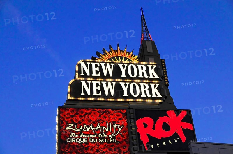Las Vegas, Nevada, USA, North America, Illuminated signs and advertising for New York New York and other attractions in Las Vegas at night, Las Vegas Strip, North America
