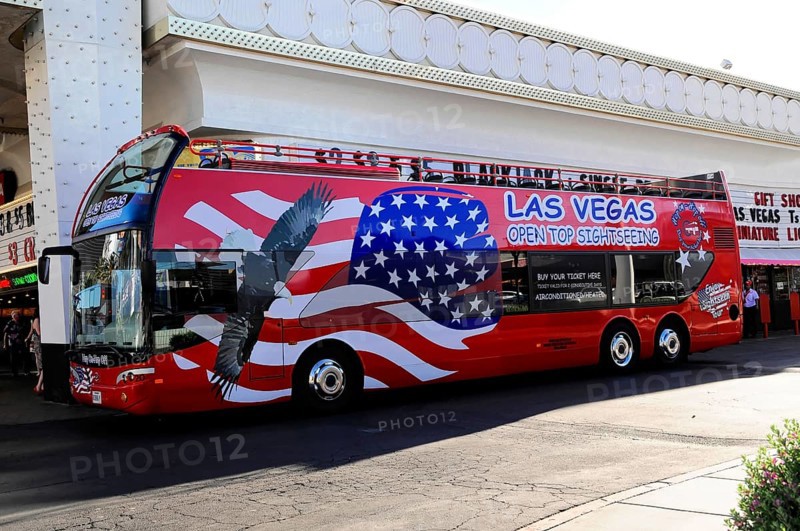Las Vegas, Nevada, USA, North America, Open-top double-decker bus for sightseeing in Las Vegas with patriotic design of the American flag and an eagle, Las Vegas Strip, North America