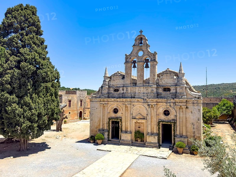 Front view facade of church monastery church Transfiguration Church dedicated to Saints Constantine and Helen and Transfiguration Christ the Saviour built from 1587 to 1600 in historic monastery Arkadi today UNESCO World Heritage Site orthodox monastery Moni Arkadi Arkadi monastery from early Middle Ages, important national monument national sanctuary on Crete island, Arkadi, Armnatos, Crete, Greece, Europe