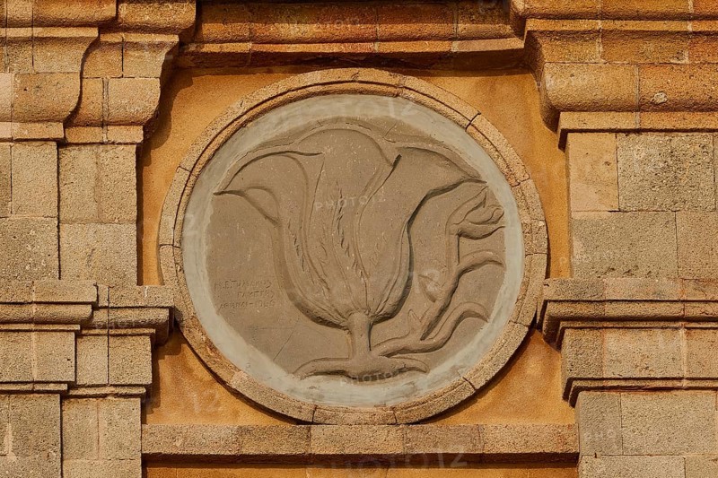 Architectural detail of a stone relief in the shape of a flower, Old Town of Rhodes, Rhodes Town, Rhodes, Dodecanese, Greek Islands, Greece, Europe