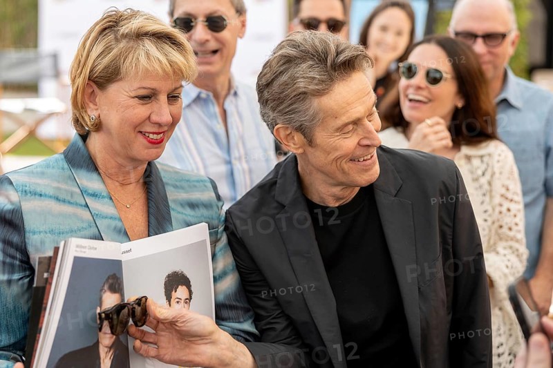 Cannes, France, 19.5.2024: Sharon Waxman and Willem Dafoe in front of talking about the new film Kinds of Kindness at The WRAP Conversations at Armani Caffe, 19.05.2024, Europe