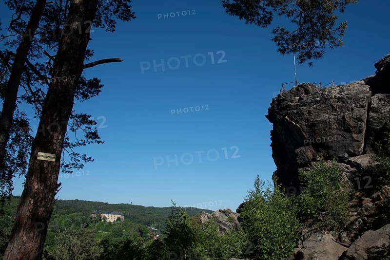 Grandfather Rock, part of the Devil's Wall, behind it Blankenburg Castle in the Harz Mountains, Blankenburg, Saxony-Anhalt, Germany, Europe