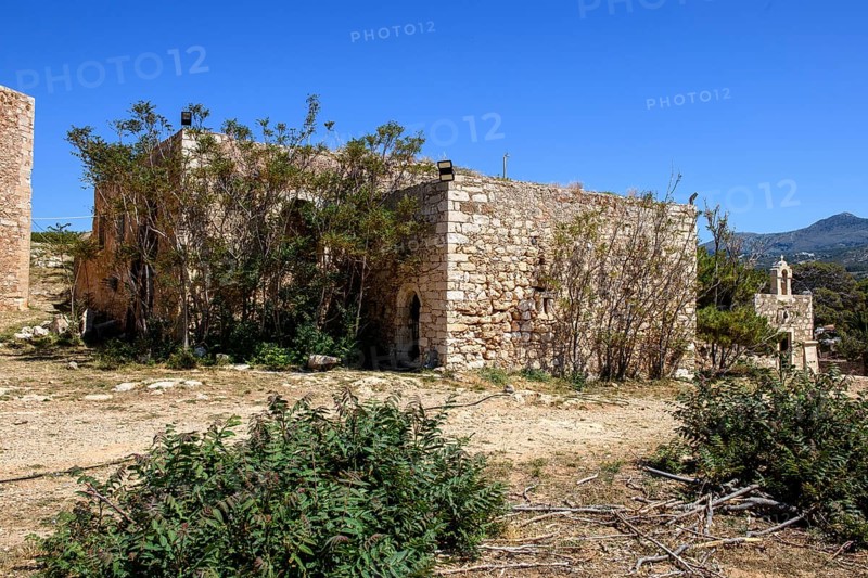 Ruin of former house of bishop from Venetian period in front of Ottoman occupation Occupation of Ottoman Empire in historical fortress Fortetza Fortezza of Rethymno built by Republic of Venice in 16th century in northwest of old town of Rethymno on rocky hill Paleokastro on north coast of island Crete, Rethymno, Crete, Greece, Europe