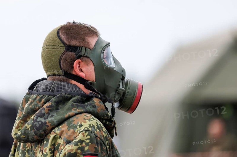 German soldiers from an NBC defence unit in protective clothing practise decontamination during the NATO Steadfast Defender large-scale manoeuvre in Pabrade, 29.05.2024