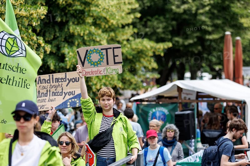 Demonstrators with signs at Fridays for Future, taken during the climate strike for the EU elections in Berlin, 31/05/2024