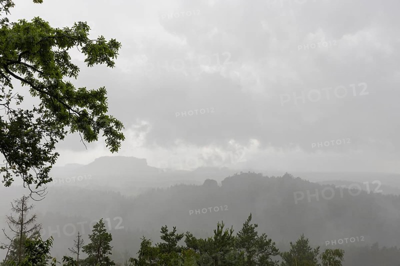 View from the goat's back in Saxon Switzerland during a thunderstorm, cloudburst, Hohnstein, Saxony, Germany, Europe