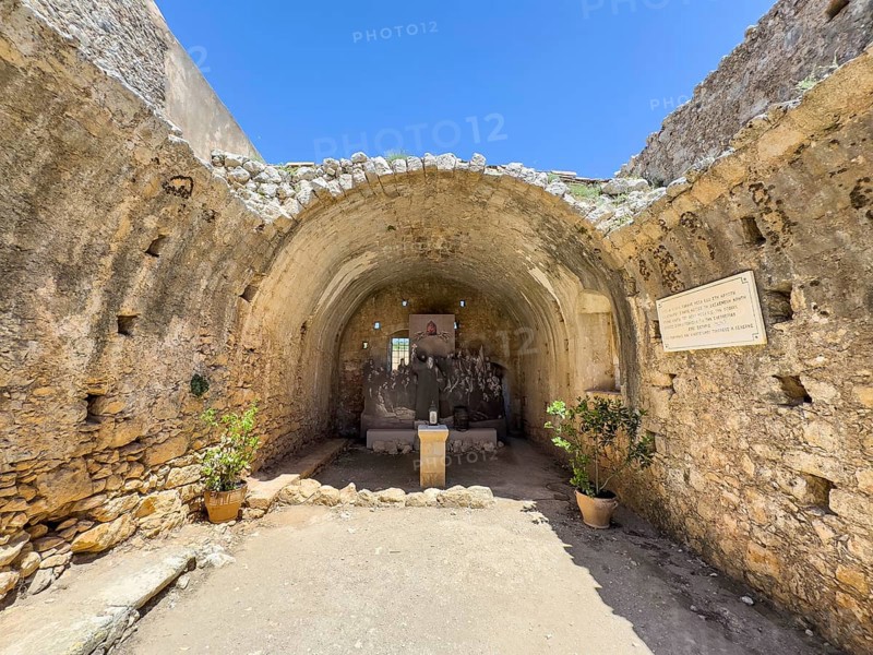 Former wine cellar during the siege by the Ottoman Empire in 1866 Storage for powder magazine where monks blew themselves up during an attack, in the background monument in the form of a copy of part of a painting by Theodoros Philippos Vryzakis in today's UNESCO World Heritage Site Orthodox Monastery of Moni Arkadi Arkadi Monastery from the early Middle Ages, important national monument National Shrine on the island of Crete, Arkadi, Armnatos, Crete, Greece, Europe