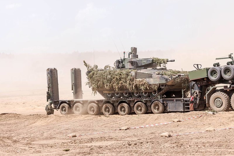 A Cougar infantry fighting vehicle is unloaded from a Mammut heavy goods transporter during the NATO Steadfast Defender large-scale manoeuvre and the German part of the exercise, Quadriga 2024, in Pabrade, 29.05.2024
