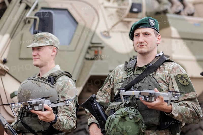 A Lithuanian army drone pilot holds a reconnaissance drone, taken during the NATO Steadfast Defender large-scale manoeuvre and the German part of the exercise, Quadriga 2024, in Pabrade, 29.05.2024