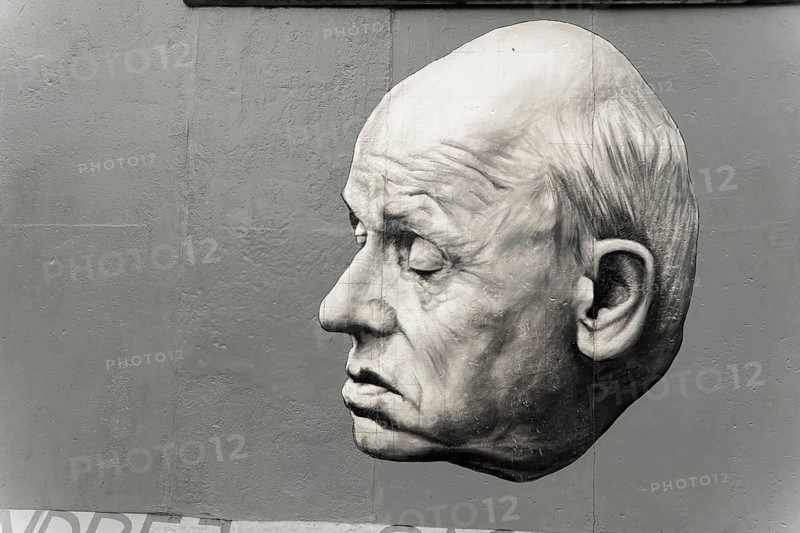 The Sakharov painting by Dmitri Vrubel in the East Side Gallery, Graffiti on the Berlin Wall in the East Side Gallery, Berlin, Germany, Europe, Realistic portrait of a sleeping or pensive man in black and white, East Side Gallery, Warschauer Strasse, Europe