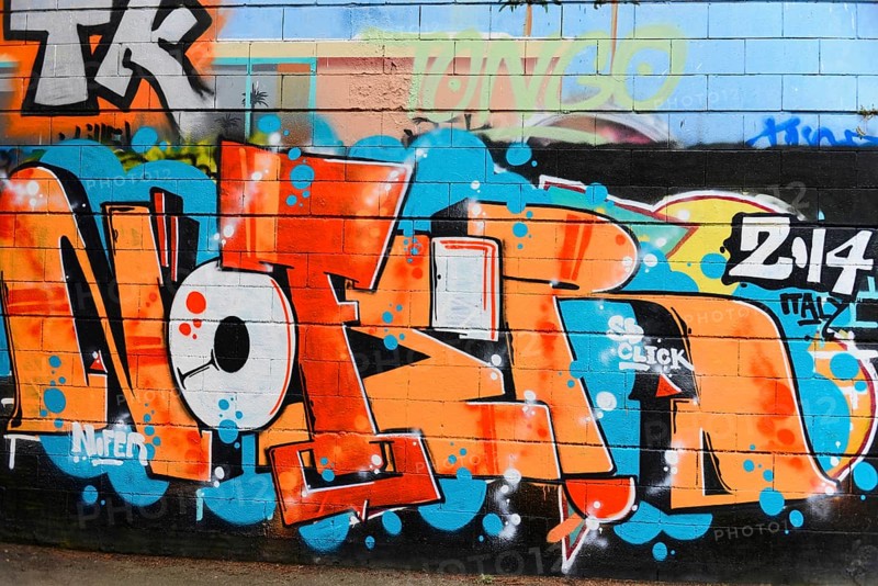Barcelona, Catalonia, Spain, Europe, Graffiti with large, colourful lettering on a wall in an urban environment, Europe