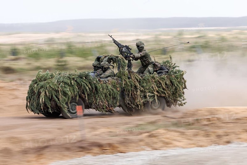 Dutch soldiers on a camouflaged Mercedes G280 CDI during the NATO Steadfast Defender large-scale manoeuvre in Pabrade, 29.05.2024