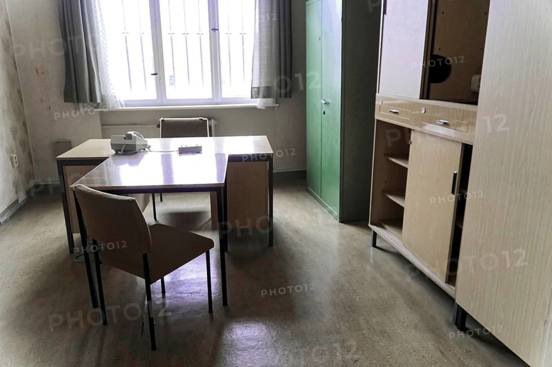 Simply furnished office with desk, chairs, filing cabinet and large window, Berlin-Hohenschoenhausen Memorial, former headquarters, Stasi remand centre, Berlin, Germany, Europe
