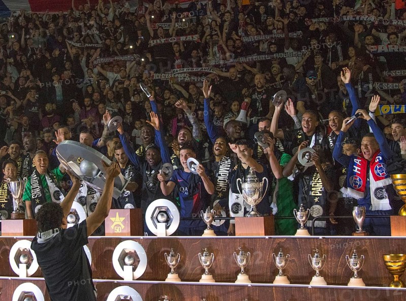 Football match, The team of the French champion 2024 Paris St. Germain celebrates with the fans in the fan curve after the award ceremony, captain MARQUINHOS holds up the French championship trophy, Parc des Princes football stadium, Paris, France, Europe