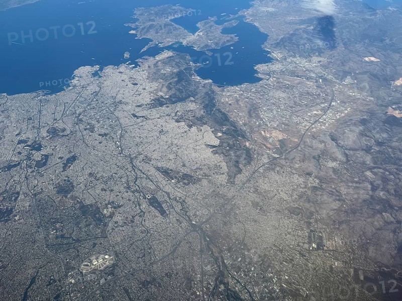 Aerial view from high altitude Overview of the city of Athens, bottom left in the picture Olympic stadium top right at the edge of the picture Elefsina military airport, Athens, Greece, Europe
