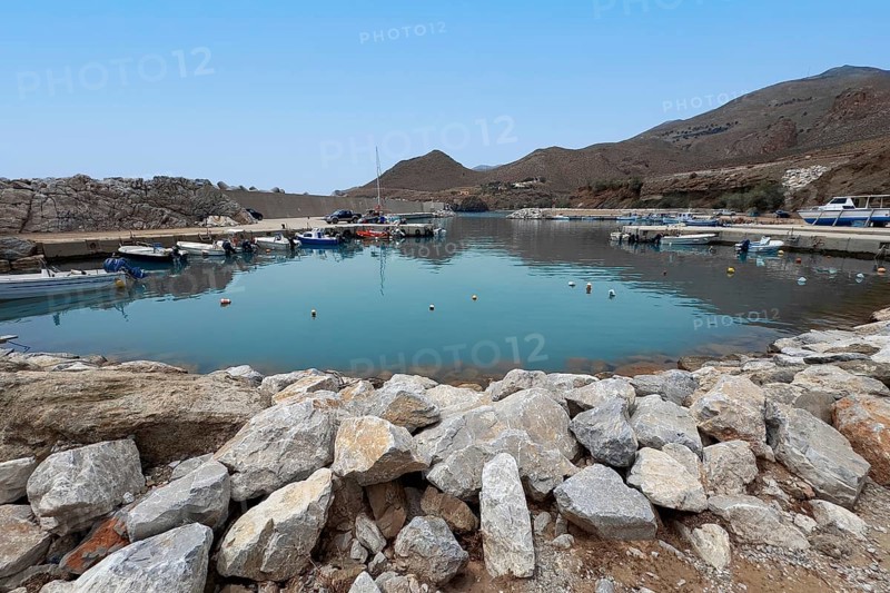 View of harbour basin of new small harbour marina of Loutra east of Lentas on south coast of island Crete at Libyan Sea Mediterranean, Loutra, Crete, Greece, Europe