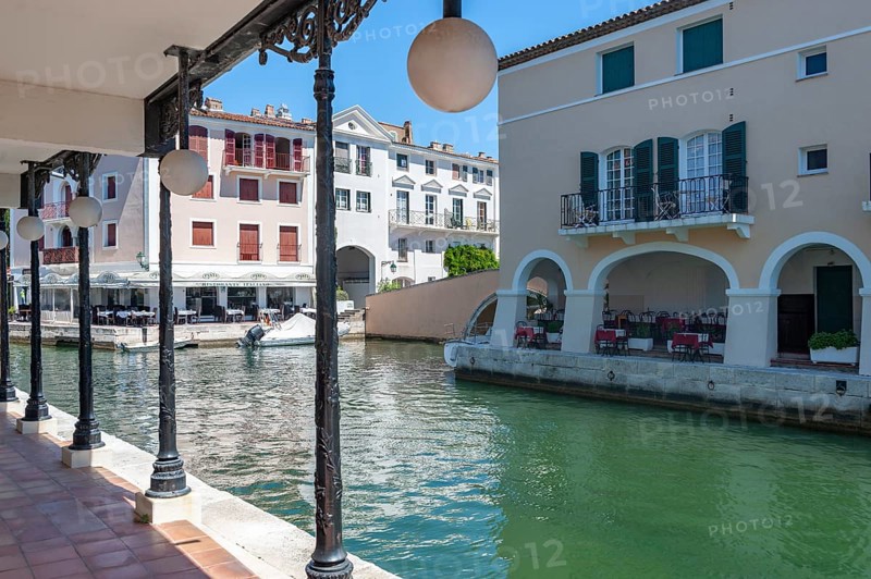 Townscape with restaurants at the Pont principal du port grimaud, Port Grimaud, Var, Provence-Alpes-Cote d Azur, France, Europe