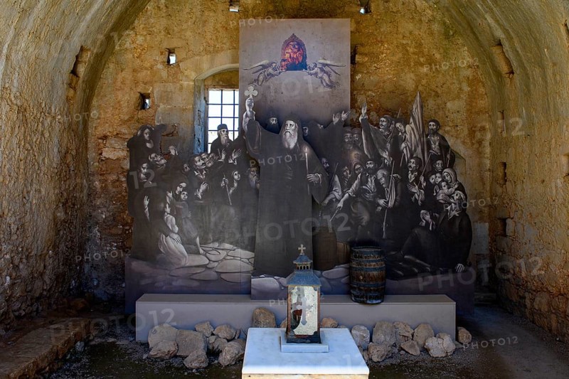 View of memorial for victims of monks inhabitants of Arkadi monastery in former wine cellar later powder room in the form of copy part of painting by Theodoros Philippos Vryzakis about self-sacrifice during siege by Ottoman Empire battle 1866 in today UNESCO World Heritage Site orthodox monastery Moni Arkadi Arkadi Arkadi monastery from early Middle Ages important national monument national shrine on island of Crete, Arkadi, Armnatos, Crete, Greece, Europe