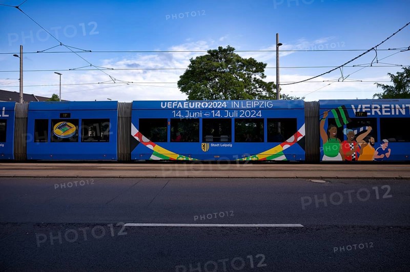 Tram, whole-car advertising for the EURO 2024, European Football Championship, Leipzig, logo, slogan Welcome to Leipzig, United by Friends, Leipzig, Saxony, Germany, Europe