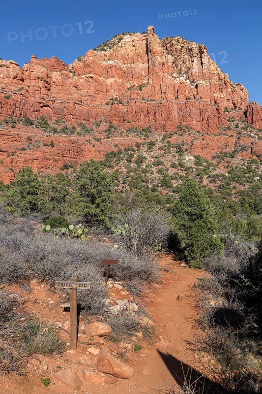 Trail marker sign for the Chapel Trail through red rock sandstone formations in Sedona, Arizona, USA, North America